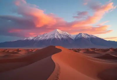 The Atacama desert at dusk transforms into a dreamlike realm as golden hour casts an ethereal glow on the rust-red sand dunes
