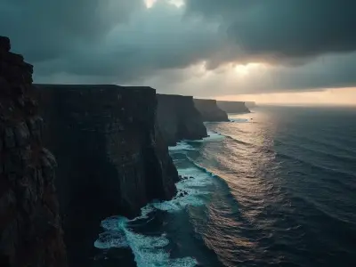 A lone Cornish coastal cliff stands resolute at dawn, its rugged granite façade set against a dark foreboding sky with ominou